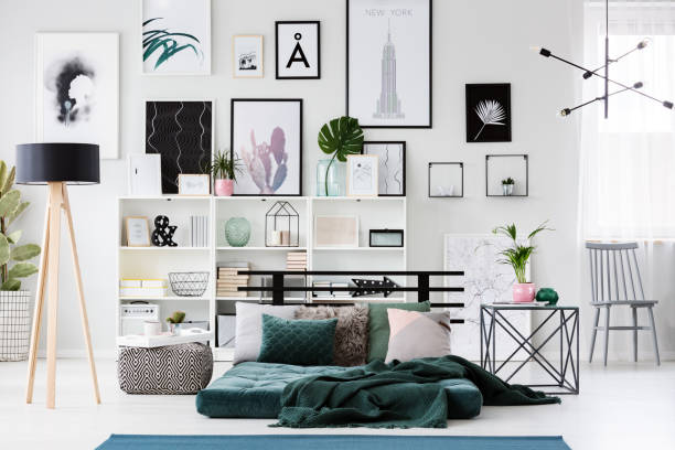 istock Gallery in green scandinavian bedroom 945344412