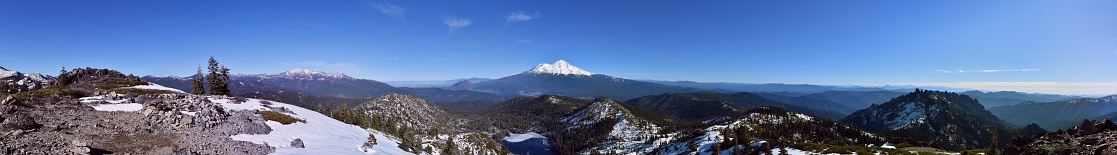 Afternoon panorama of Mt. Shasta from summit above Castle Lake, California, Feb 2018.