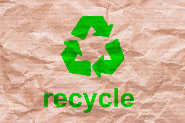 istock recycle sign on wrapping paper 945351646