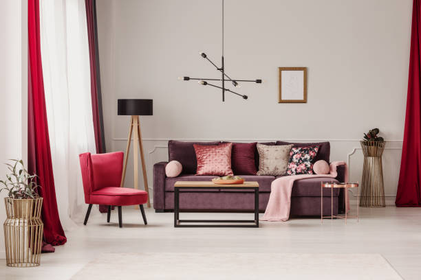 istock Sophisticated red living room 945354634