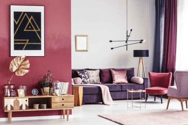 istock Gold and red living room 945354640