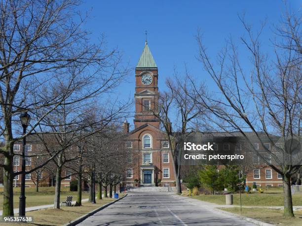 College With Clocktower Stock Photo - Download Image Now - University, Campus, Clock Tower