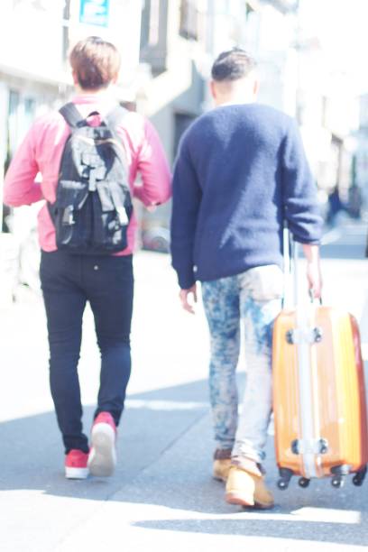 istock Young same sex couples on the trip 945358046