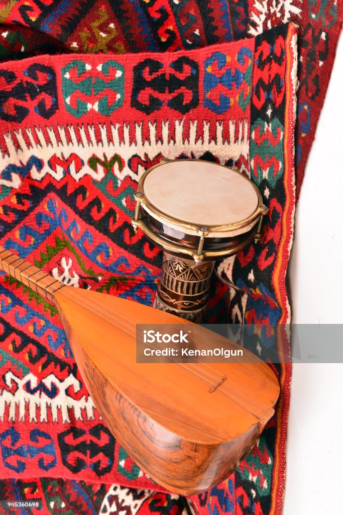 Saz baglama Turkish Music Instrument Isolated on kilim, Anatolia Stock Photo