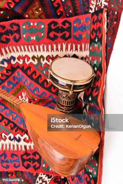 Saz Baglama Turkish Music Instrument Isolated On Kilim Stock Photo - Download Image Now