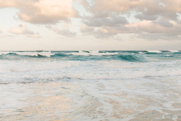 istock Waves Crashing on a Rocky Beach 945369880