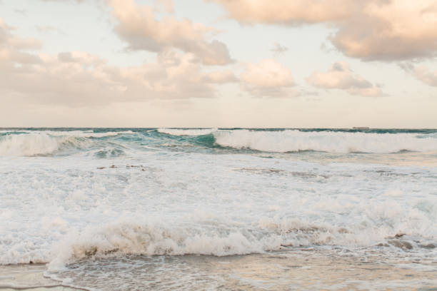 istock Waves Crashing on a Rocky Beach 945370092