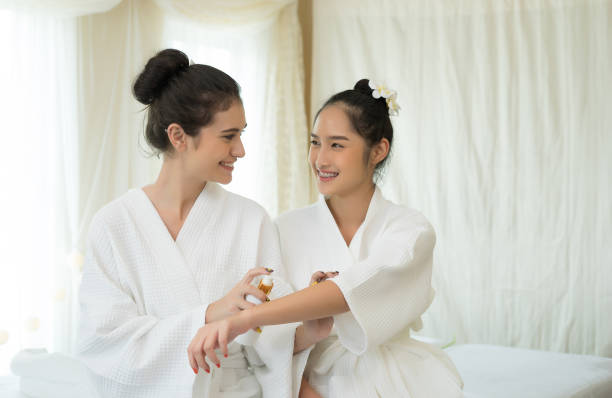 istock Two beautiful women relaxing before massage talking in spa 945374336