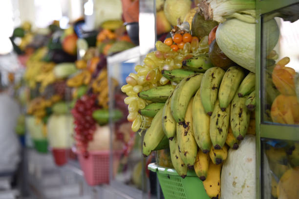 CUZCO, PERU - March 29, 2018: Mercado San Pedro, a sprawling indoor and outdoor market where locals shop for fresh produce and groceries.