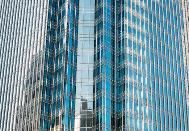 istock Bottom up view of Modern office building in Hong Kong 945377594