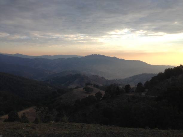 istock Countryside hilltops mountains at Sunset 945377922
