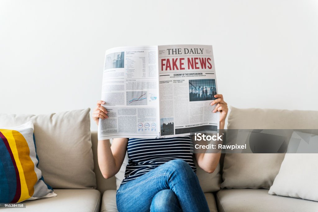 Woman reading newspaper on a couch Woman reading newspaper on a couch

***These are our own 3D generic designs. They do not infringe on any copyrighted designs.*** Newspaper Stock Photo