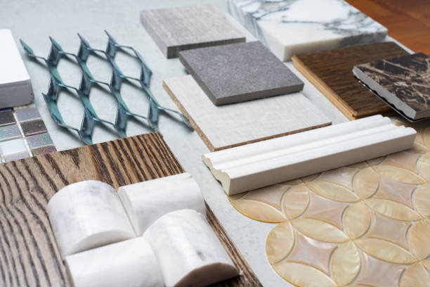 istock samples of material, wood , on concrete table.Interior design select material for idea. 945387720