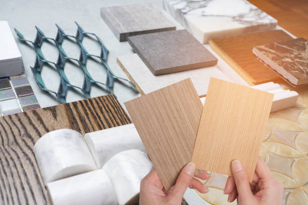 istock samples of material, wood , on concrete table.Interior design select material for idea. 945387722
