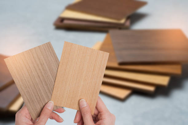istock samples of material, wood , on concrete table.Interior design select material for idea. 945387734