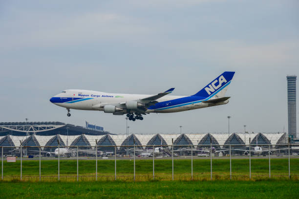 Nippon Cargo Airlines Plane landing to runways at suvarnabhumi international airport in Bangkok ,Thailand. Bangkok, Thailand - July 30, 2017: Nippon Cargo Airlines Plane landing to runways at suvarnabhumi international airport in Bangkok ,Thailand. This airport is one of the most populated airports in the world. nippon cargo airlines photos stock pictures, royalty-free photos & images