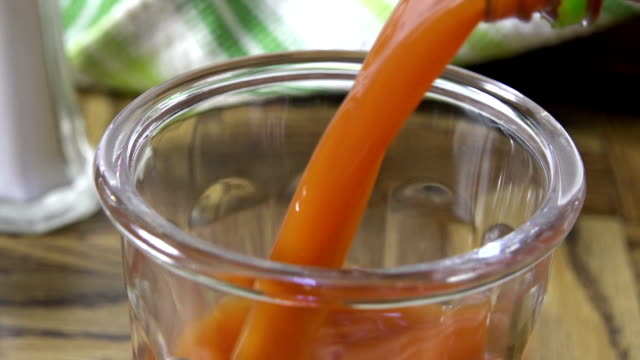 Pouring tomato juice
