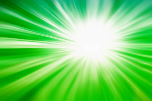 istock dark and soft green light  abstarct  sunburst l background 945394658