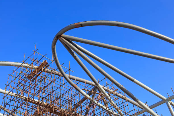istock Arc steel tube landscape architecture in a construction site 945395050
