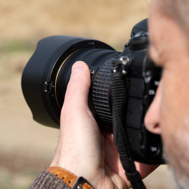istock Nature photographer in mountains 945398994