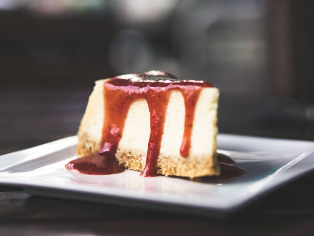 istock Close up of Strawberry Cheesecake served in cafe. 945399032
