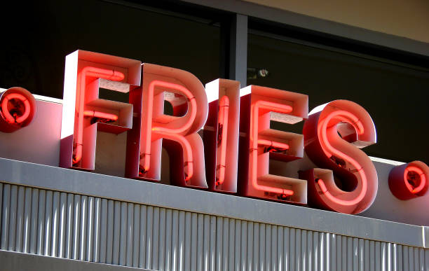 istock neon fries sign 945402146