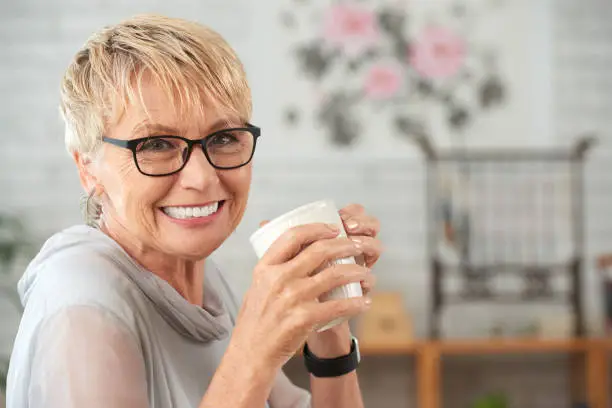 Photo of Woman with coffee cup