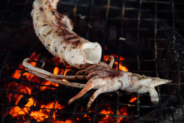 istock Grilled squid or octopus at Thai seafood market 945412570