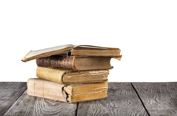 istock Stack of old books on a wooden table 945412832
