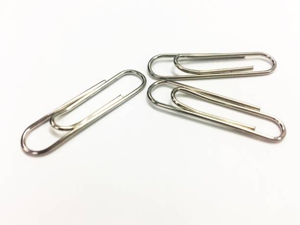istock Paper clip on the white background-Office tool. 945420128