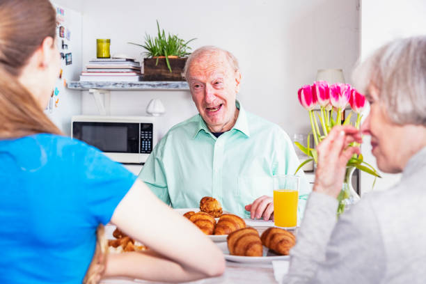 istock Talking to family and smiling widely. 945420282