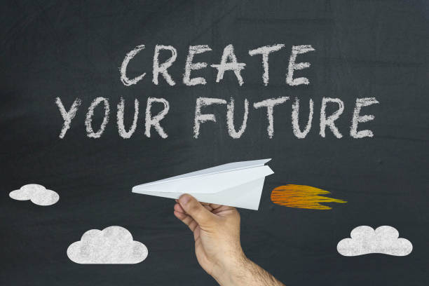istock create your future concept with flying airplane on chalkboard 945423554