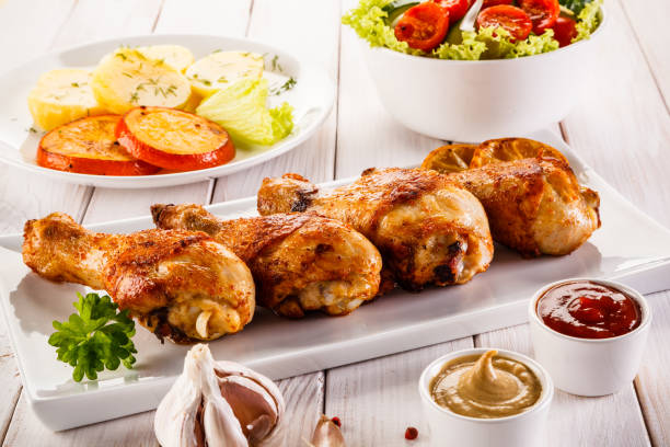 Barbecued chicken drumstick with vegetables