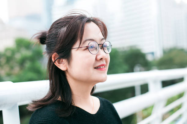 istock Beautiful woman looking away 945427444