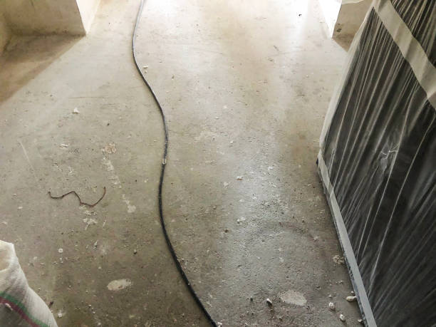 istock Metal, iron reinforcement lying on the ground on the construction site. Material for repairs in an apartment is under construction remodeling rebuilding and renovation 945428048