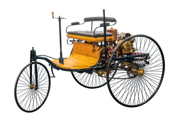 replica of a old historic vehicle named patent motorcar isolated in white back