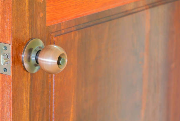 istock door knob closeup or handle in wooden with copy space add text select focus with shallow depth of field 945431436