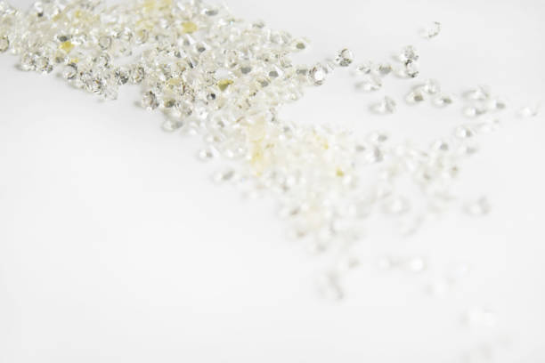 istock Background blur small white and yellow gems shine. 945434978