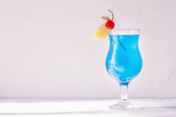 istock Blue Curacao cocktail decorated with fruit 945435714
