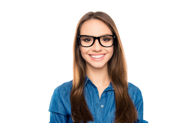 Portrait of young happy teacher in glasses with beaming smile Portrait of young happy teacher in glasses with beaming smile isolated businesswoman isolated on white beauty stock pictures, royalty-free photos & images