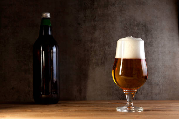 istock beer glass ale with foam 945461454