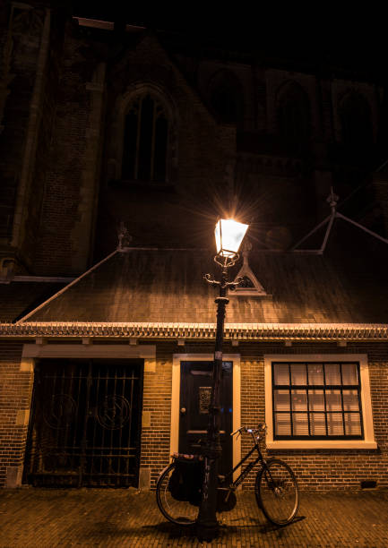 Odense, Denmark - April 26, 2015: City life in Odense central area. Night view of Odense ststion