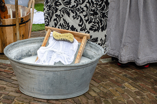 Traditional style washing tub with wash board and brush