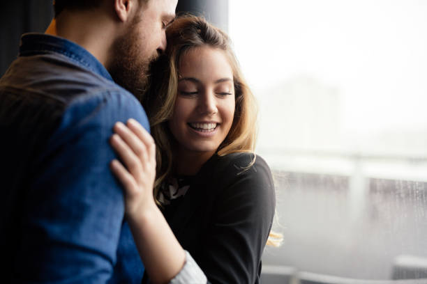 istock Happy couple hugging and sharing emotions 945473498