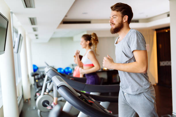 istock People running on treadmill in gym 945474828