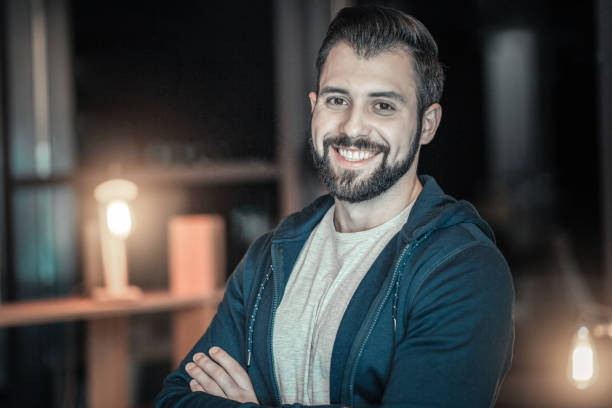 istock Handsome happy man satisfied with results 945475534