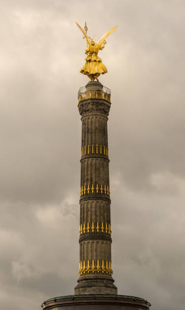 istock The Victory column in Berlin Tiergarten, at cloudy winter day. Back view 945486988
