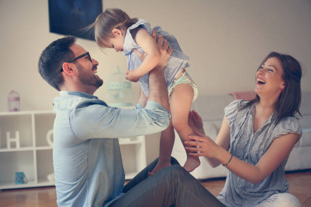 istock Happy family with one child. 945492436