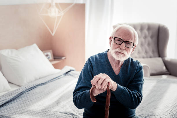 istock Pleasant senior man sitting in the bedroom 945507814