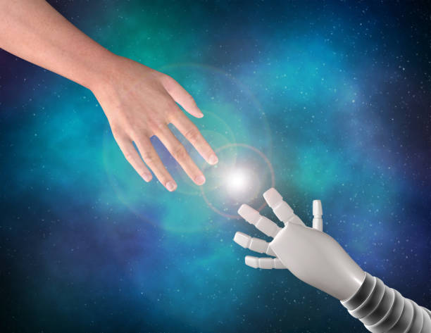 istock Artificial intelligence concept with human and robot hand together on blue galaxy background. 945513398